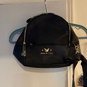 Sanrio Black Backpack with Gold Accents